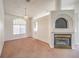 Dining area with carpet, fireplace and access to kitchen at 2149 Eaglepath Cir, Henderson, NV 89074