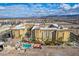 Aerial view of Boca Raton Condominiums with pool and landscaping at 2405 W Serene Ave # 536, Las Vegas, NV 89123