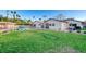 Large backyard with grassy area and patio at 3104 Conners Dr, Las Vegas, NV 89107