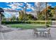 Landscaped backyard with patio and grassy lawn at 3104 Conners Dr, Las Vegas, NV 89107