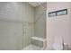 Contemporary bathroom with a glass-enclosed shower and built-in bench at 3104 Conners Dr, Las Vegas, NV 89107