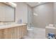 Modern bathroom with a glass-enclosed shower, sleek vanity, and clean design at 3104 Conners Dr, Las Vegas, NV 89107