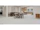 Charming dining area with seating for four, seamlessly connected to the kitchen and living space at 3104 Conners Dr, Las Vegas, NV 89107