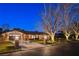 Brick home with driveway and landscaping at night at 3104 Conners Dr, Las Vegas, NV 89107