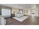 Spacious main bedroom features a sitting area, ensuite bathroom entrance and large windows providing natural light at 3104 Conners Dr, Las Vegas, NV 89107