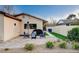 Brick patio with seating area and built-in grill at 3104 Conners Dr, Las Vegas, NV 89107