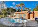 Relaxing kidney-shaped pool and brick patio at 3104 Conners Dr, Las Vegas, NV 89107