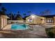 Inviting kidney shaped pool with brick patio at 3104 Conners Dr, Las Vegas, NV 89107