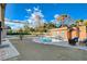 Inviting kidney-shaped pool with brick patio at 3104 Conners Dr, Las Vegas, NV 89107