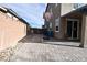 Backyard with basketball court and paved patio at 3439 Midnight Shadows Way, North Las Vegas, NV 89032