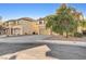 Two story house with a two car garage and partially visible front yard at 4029 Treasured Note Ct, Las Vegas, NV 89129