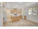 Kitchen features light wood cabinets and an island at 4029 Treasured Note Ct, Las Vegas, NV 89129