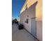 Backyard area features an air conditioning unit and an exterior door at 4466 Palm Grove Dr, Las Vegas, NV 89120