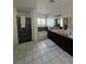 Bright bathroom with a glass shower, soaking tub, and modern vanity for a spa-like experience at 4466 Palm Grove Dr, Las Vegas, NV 89120