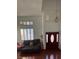 High ceiling entryway with an overhead window and comfortable seating at 4466 Palm Grove Dr, Las Vegas, NV 89120