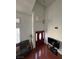 High ceiling entryway with a large window, front door and comfortable seating at 4466 Palm Grove Dr, Las Vegas, NV 89120