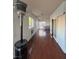 Bright hallway leading to an enclosed backyard patio at 4466 Palm Grove Dr, Las Vegas, NV 89120