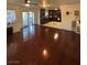 Open concept living room with a view into the kitchen at 4466 Palm Grove Dr, Las Vegas, NV 89120