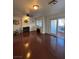 Bright living room with sliding glass doors and a fireplace at 4466 Palm Grove Dr, Las Vegas, NV 89120