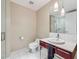 Clean bathroom with single sink vanity and shower at 4471 Dean Martin Dr # 1002, Las Vegas, NV 89103