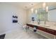 Elegant bathroom with double sinks, marble flooring, and a large shower at 4471 Dean Martin Dr # 1002, Las Vegas, NV 89103