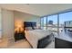 Bedroom with city view and comfortable bed at 4471 Dean Martin Dr # 1002, Las Vegas, NV 89103