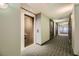 Building hallway with modern decor and carpet flooring at 4471 Dean Martin Dr # 1002, Las Vegas, NV 89103
