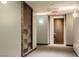 Building hallway with modern decor and carpet flooring at 4471 Dean Martin Dr # 1002, Las Vegas, NV 89103