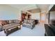 Spacious living room with kitchen view and comfy seating at 4471 Dean Martin Dr # 1002, Las Vegas, NV 89103