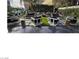 Outdoor patio with modern seating and a fire pit, perfect for relaxing at 4471 Dean Martin Dr # 1002, Las Vegas, NV 89103