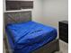 Bedroom with tile floors and a dresser at 5100 Pebble Beach Blvd, Las Vegas, NV 89108