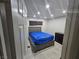 Bedroom with tile floors and a dresser at 5100 Pebble Beach Blvd, Las Vegas, NV 89108