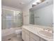 Clean bathroom with shower/tub combo and updated vanity at 7755 Coley Ave, Las Vegas, NV 89117