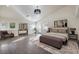 Spacious primary bedroom with wood floors and private access to backyard at 7755 Coley Ave, Las Vegas, NV 89117