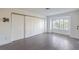 Bedroom with sliding closet doors and window seat at 7755 Coley Ave, Las Vegas, NV 89117