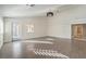 Bright and airy bedroom with hardwood floors and access to en-suite bathroom at 7755 Coley Ave, Las Vegas, NV 89117