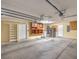 Garage with built-in storage and shelving at 7755 Coley Ave, Las Vegas, NV 89117