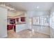 Eat-in kitchen with dark wood cabinets and backyard access at 7755 Coley Ave, Las Vegas, NV 89117