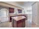 Open kitchen with granite island and breakfast bar at 7755 Coley Ave, Las Vegas, NV 89117
