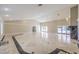 Large living room featuring high ceilings and tile flooring at 7755 Coley Ave, Las Vegas, NV 89117