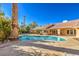Relaxing kidney-shaped pool and patio area at 7755 Coley Ave, Las Vegas, NV 89117