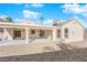 Covered patio with concrete flooring and gravel landscaping at 8221 Ten Gallon Ct, Las Vegas, NV 89129