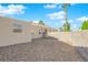 Backyard with gravel and block wall at 8221 Ten Gallon Ct, Las Vegas, NV 89129