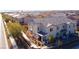Aerial view of a community featuring multiple homes and green spaces at 846 Star Estates Ave, North Las Vegas, NV 89086