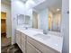 Bathroom featuring double vanity, large mirror, and tile flooring at 846 Star Estates Ave, North Las Vegas, NV 89086