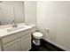 Powder room features a sleek white vanity, sink, and modern toilet at 846 Star Estates Ave, North Las Vegas, NV 89086