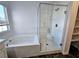 Bright bathroom featuring soaking tub and separate glass enclosed shower at 846 Star Estates Ave, North Las Vegas, NV 89086