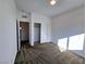 This bright bedroom features neutral carpet and a closet space with paneled doors at 846 Star Estates Ave, North Las Vegas, NV 89086