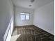 Bright bedroom featuring neutral carpet and a window providing natural light at 846 Star Estates Ave, North Las Vegas, NV 89086