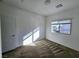 Carpeted bedroom with white walls and window at 846 Star Estates Ave, North Las Vegas, NV 89086